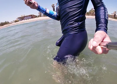 Surfer Gets Erect in His Lycra for the Pleasure of the People
