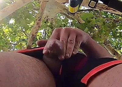 Bulging Young Man Moans with Pleasure in Park Jerking off a Summer Handjob