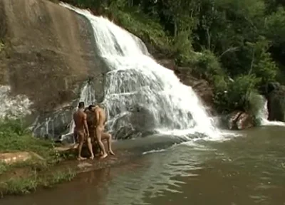 Three Nude in the River