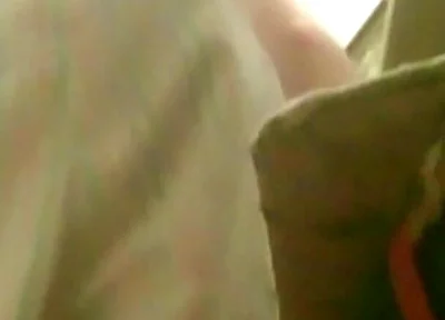A Young Guy Is Sitting on a Chair with Anal Prolapse