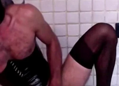 Latex Masked Sissy in Pvc Corset Cums Hard on Stockings and Heels