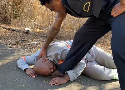 Vigilante Humiliating the Worker