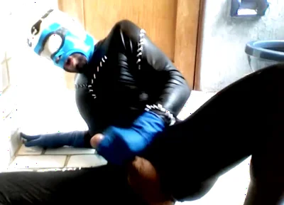 Blue Hornet in Spandex Catsuit Cums on Blue Latex Gloes and Mask