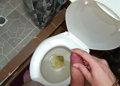Two Shots of Cum on the Pee in the Bathroom