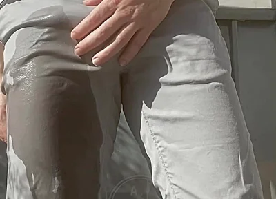 Jules Wets His Grey Pants and Exposes His Semi-hard Cock Through His Trousers