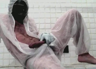 Masked Femboy in Suit Pees Itself and Cums