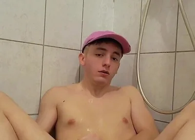 Young Twink Plays with His Piss and Jerks off