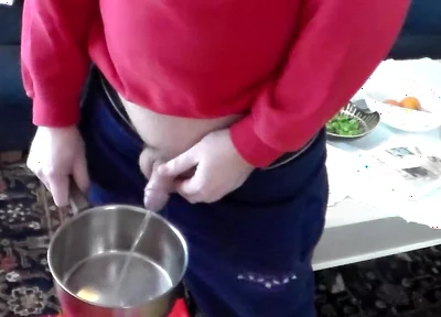 John Is Pissing Into a Kitchenpot