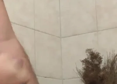 In the bathroom with a beach ball