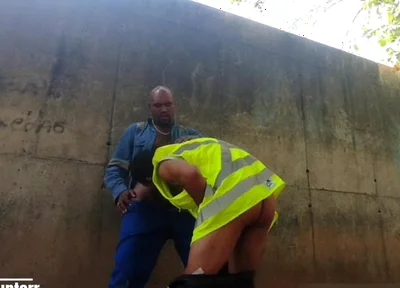 Two Workers Behind the Service Wall
