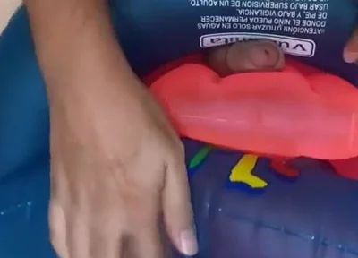 Playing with inflatable swim ring