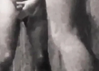 A Boy Is Discussing with His Horny Stepdad in the Pool's Public Showers When Stepdaddy Suddenly Pees on Him
