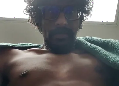 Masturbating