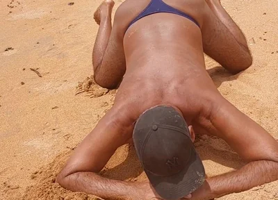 Ladysmith Doing a Striptease on the Beach Showing off Her Tanned Ass with Sexy Mark