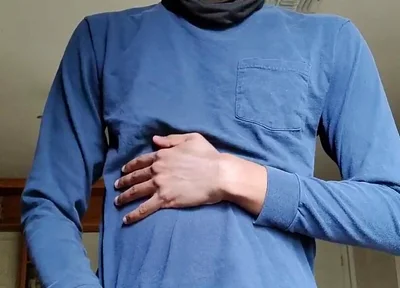 Masturbating
