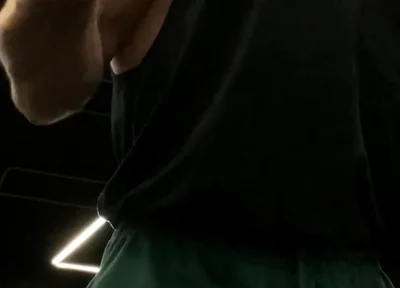Doing a Biceps Curls with a Straight Barbell