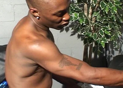 Tattooed Black Man Spanks and Bangs a Dude with Tight Asshole in Bareback Style