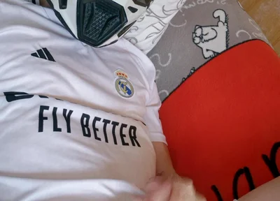 The Guy Is Wearing a Soccer Uniform and Mxhelmet with a Morning Cum