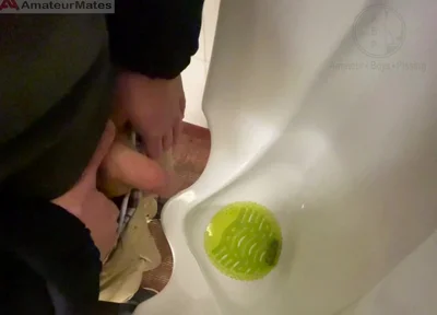 Amateur Redhead Guy Caught Pissing in a Public Toilet's Urinal - He Then Quickly Plays with His Cock Before Leaving