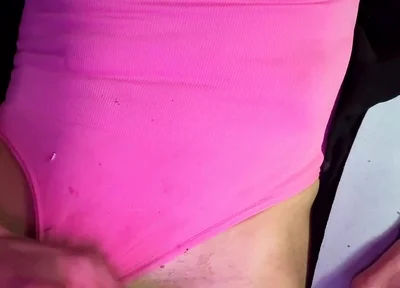 Crossdresser Michelle Wearing Pink Bodysuit While Playing with Cock