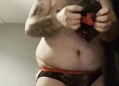 Anal Crossdressers Cuffed Cock and Ball with Pierced Nipples