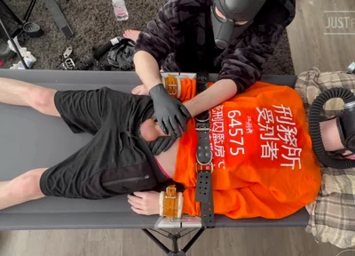 Gas Mask Boy Strapped Down and Edged