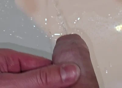 Pissing to the Bathroom Sink