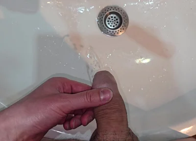 Pissing to the Bathroom Sink
