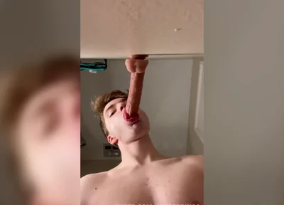 Cock Hungry Twink Slobbers on Giant Dildo!