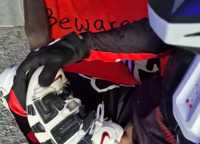 An Excited Guy in Motorcycle Gear Fucks His Sneakers
