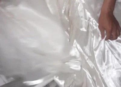 Cum Flows on Satin Wedding Dress