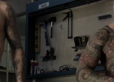 Two Friends in the Mechanic's Workshop