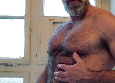 Hairy Muscle Daddy Strokes Uncut Cock