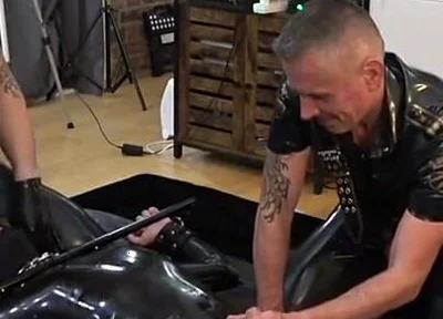 Rubber Gimp Bound and Used by Two Latex Guys Part 1