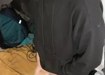 I Masturbate in Sweatpants, a Black Sweatshirt and Nike Sneakers