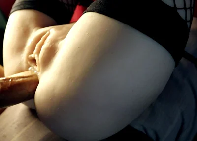 A Beauty in Stockings Spreads Her Charms in Front of a Big Cock