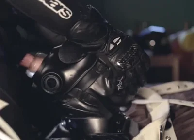 Rubber boy sucking biker master cock