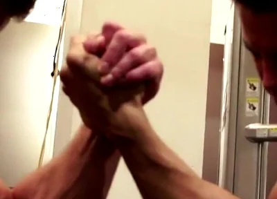 Amateur Fitness Guys Arm Wrestle in the Gym