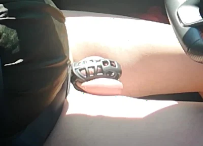 Small Penis in Cage While Driving in Pantyhose