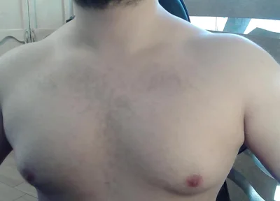 Muscular Stud Plays with His Nipples and Muscles
