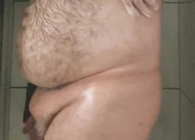 Fat Bear Taking a Shower