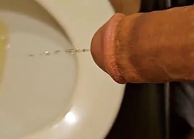Shaved Cock Pissing