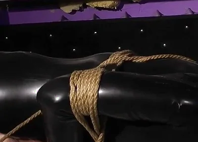 Roped in Latex: Zeus Struggles to Break Free