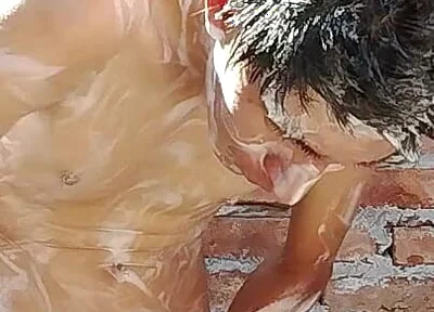 Latin Guy Bathing After a Long Day at Work