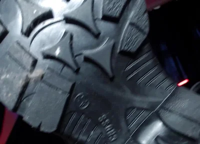 Alpha in Leather, Foot and Spit Domination