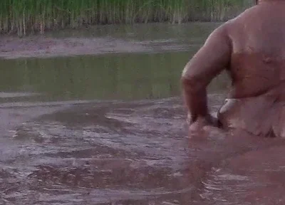 Mud Bath in Deep Quarry Mud Pond