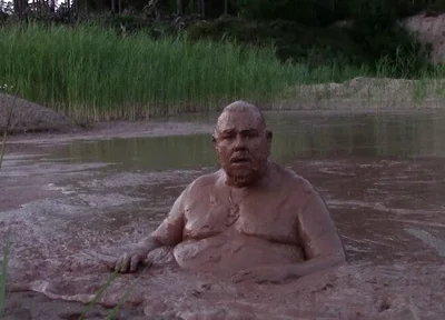 Mud Bath in Deep Quarry Mud Pond