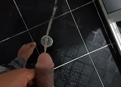 Urinating in Dark Jeans