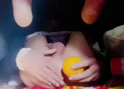 A Young Man Stuffs a Crystal Ball and an Orange up His Tight Ass.