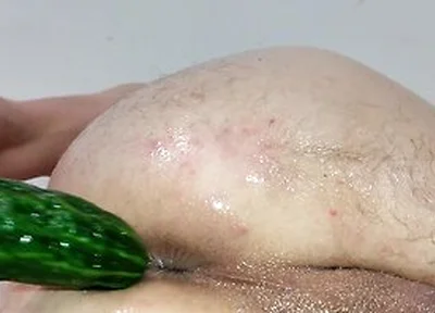 Close Up Cucumber Insertion With Massage Oil And Precum As Lube